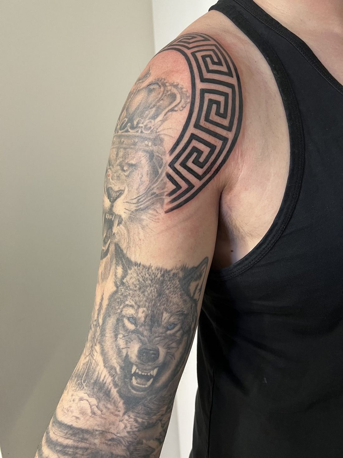 Tattoo: Black & grey — Lion and wolf sleeve, alternate view